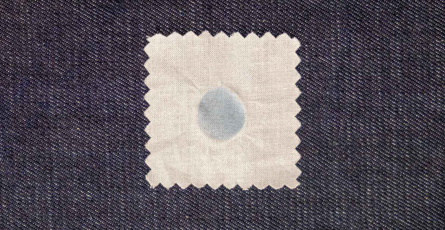 Wet crocking fastness comparison between a indigo dyed denim fabric before and after Fst Control application