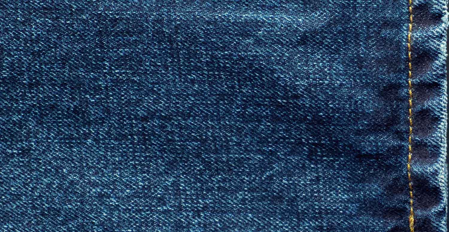 Comparison between a raw denim fabric before and after stone washing with Garmon's Geopower Nps