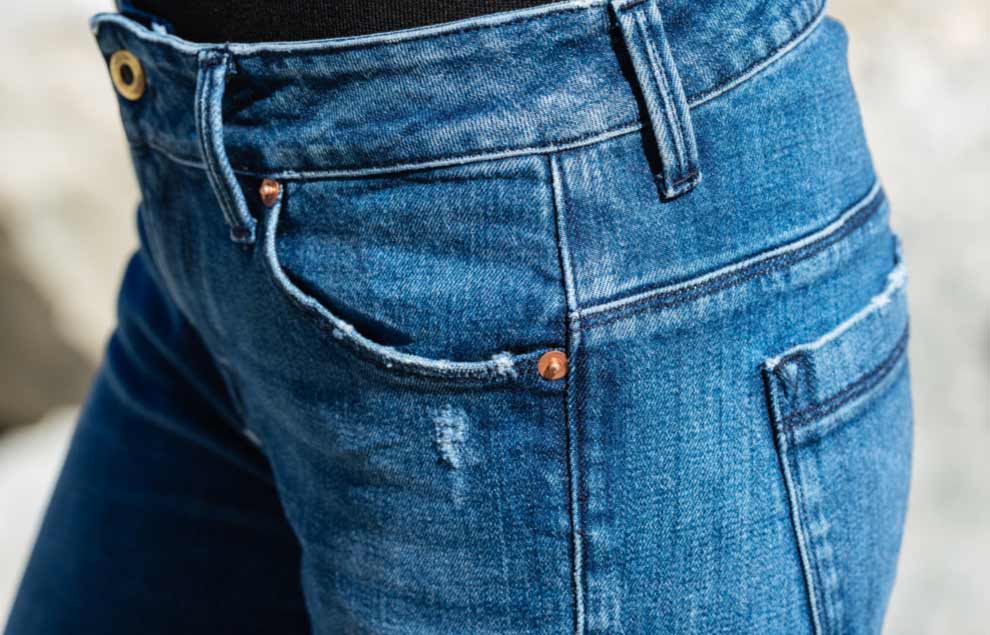 Lavagem de pedra de denim enzimática com produtos Garmon